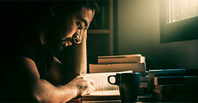 Man reading at his desk